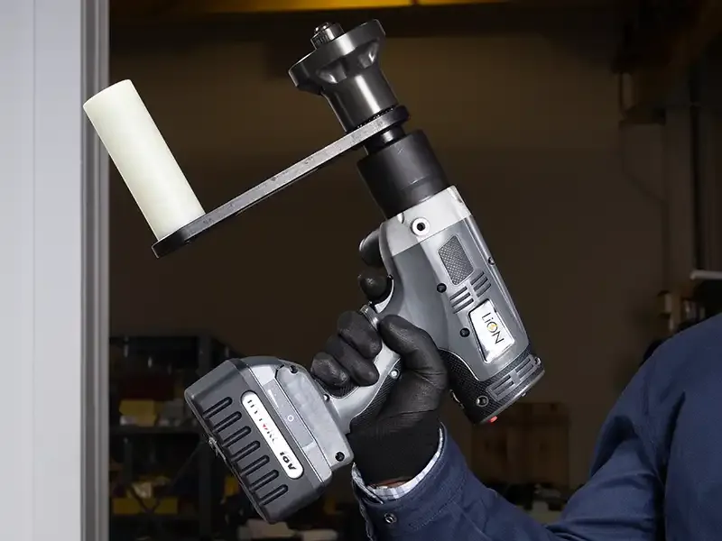 HYTORC Centerlock Kit LION GUN tool held in a gloved hand