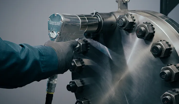 HYTORC jGun Single Speed pneumatic torque tool in use on an application