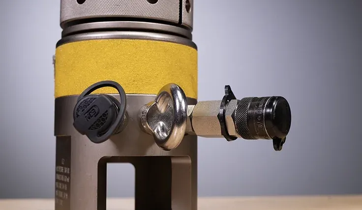 Subsea tensioner one-piece body